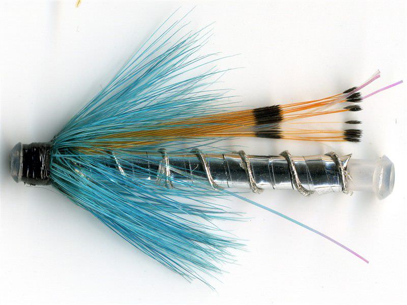 The Essential Fly Holo Silver Blue (Nylon Tube) Fishing Fly